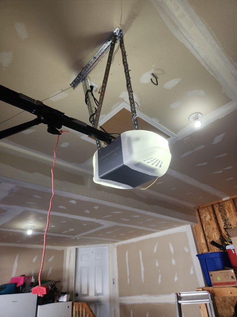 Chamberlain myQ garage door opener installed on a garage ceiling in Ottawa