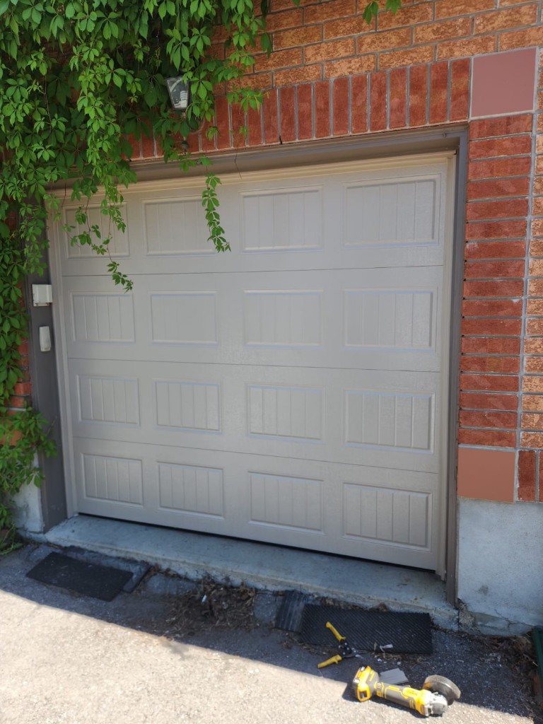 Beige door · brick home — Rockcliffe Park — Ottawa Garage Tech